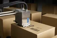 The Cx350i remote head printing downwards onto a horizontal surface